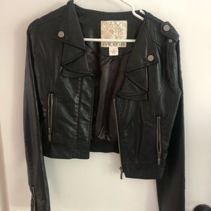Arden B worn black leather jacket